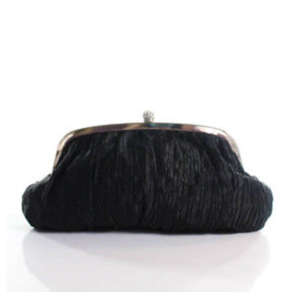 Neiman Marcus Handbags - Neiman Marcus clutch that converts to crossbody